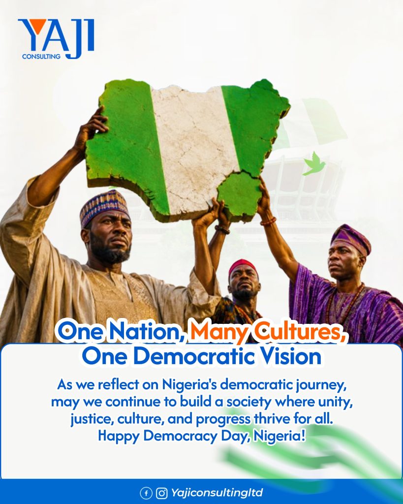 “Nigerian cultural representatives holding a map of Nigeria painted in green and white during Democracy Day celebration.”